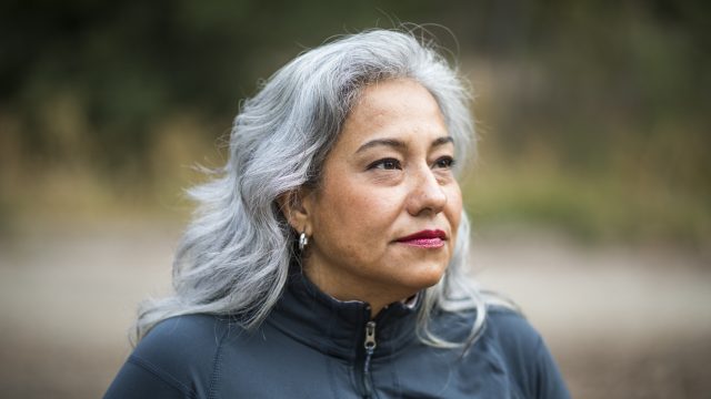 White hair woman looking at space